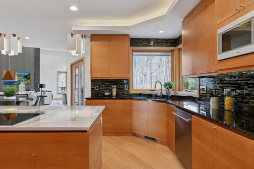 Elevate your kitchen experience with the Delta Trinsic pull-down faucet featuring touch technology