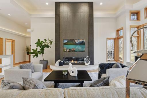 Recenty updated for modern living, a recessed area for flush TV mounting with integrated power accessories