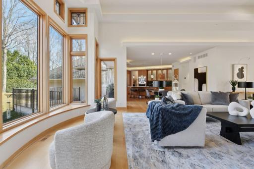 The living area flows seamlessly into the kitchen and informal dining space