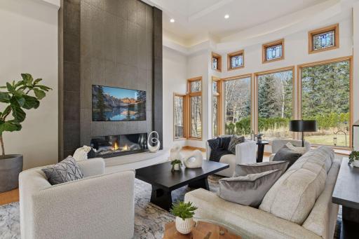 Featuring a 60" direct vent gas fireplace, this great room gathering space is perfect for entertainin