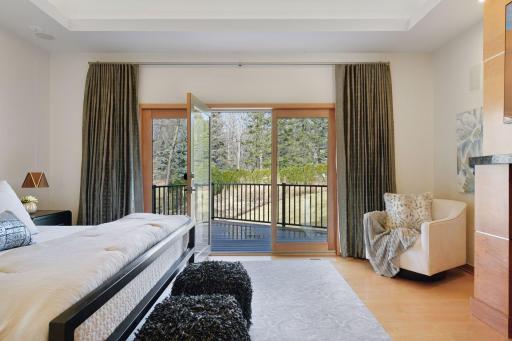 Enjoy direct access to a private deck from the primary suite