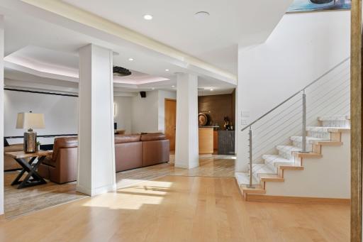Make your way to the lower level to discover an entertainer's dream space