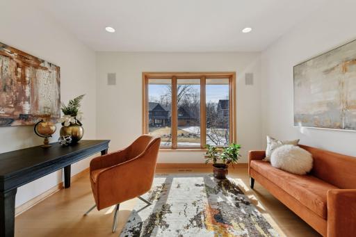 The second well-appointed bedroom on the main floor offers versatility, perfect for use as a home office space
