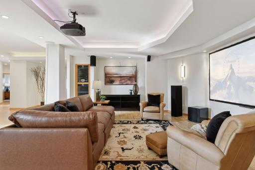 Enjoy a hidden home theater system with in-wall surround sound for an immersive experience