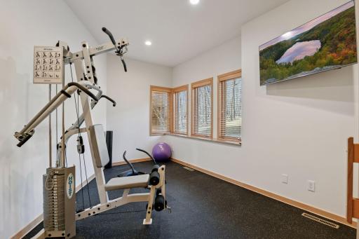 Spacious lower level exercise room offers new rubber flooring