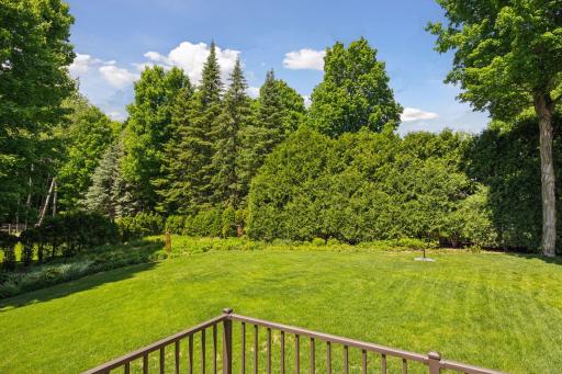 Enjoy the spacious yard, complete with a new storage shed for all your lawn equipment and tools
