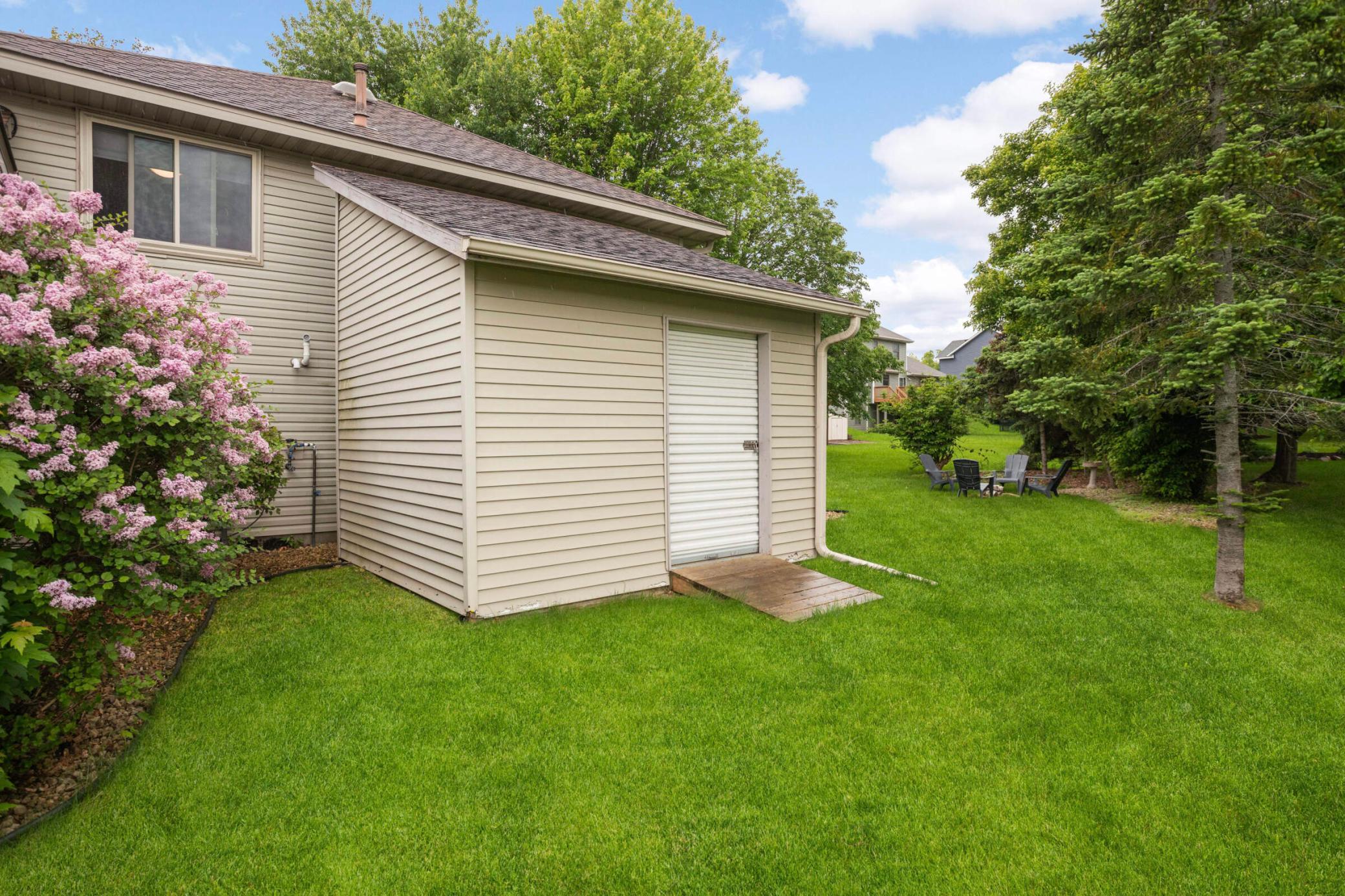 Large storage shed is perfect for mowers, patio furniture, and more