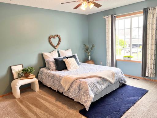 Owner's Suite has plenty of room for a King bed, Queen shown