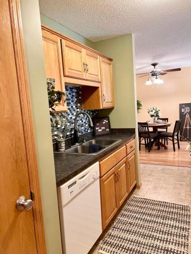 The walk-in kitchen pantry is the door shown on the left, perfectly placed for easy loading from the garage after your Costco run!