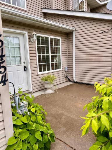 Patio entrance big enough for a table and chairs and a grill!