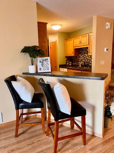 Breakfast bar with seating for 2-3 depending on the size of barstool, these are on the larger side