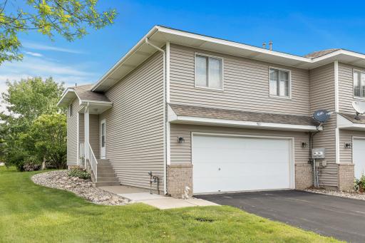 Step into this cute end-unit townhome that combines comfort, style, and convenience!