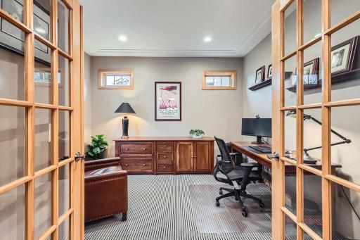Enjoy the flexibility of a main-floor office. French doors close if quiet and privacy is desired.