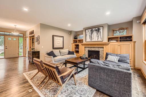 Spacious front entry greets your visitors and large living room offers a wonderful gathering spot. Gas fireplace is perfect for chilly nights. In home speaker system to enjoy music throughout home and on deck.