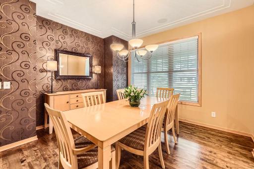 Main floor dining room with solid maple floors. Could also be a reading nook or sitting area if a formal dining room isn't needed.