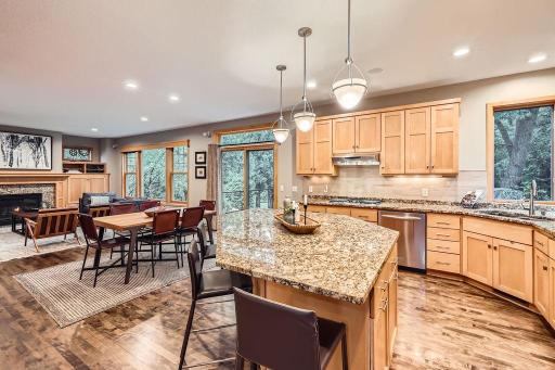 The heart of the home is a chefâs dream kitchen, featuring a massive granite center island perfect for entertaining. Abundant cabinet and counter space - room for all the dining and cooking essentials!