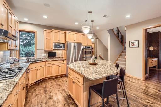 Gorgeous kitchen with large dining space plus a formal dining room, if desired.