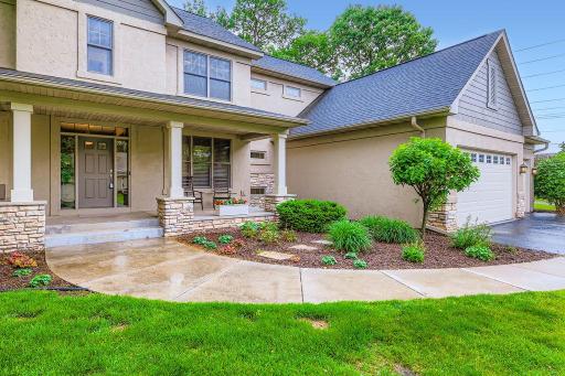 Welcoming covered front porch greets your guests and offers a nice spot to enjoy outdoor living in the warmer months. Solid construction in this custom built home.
