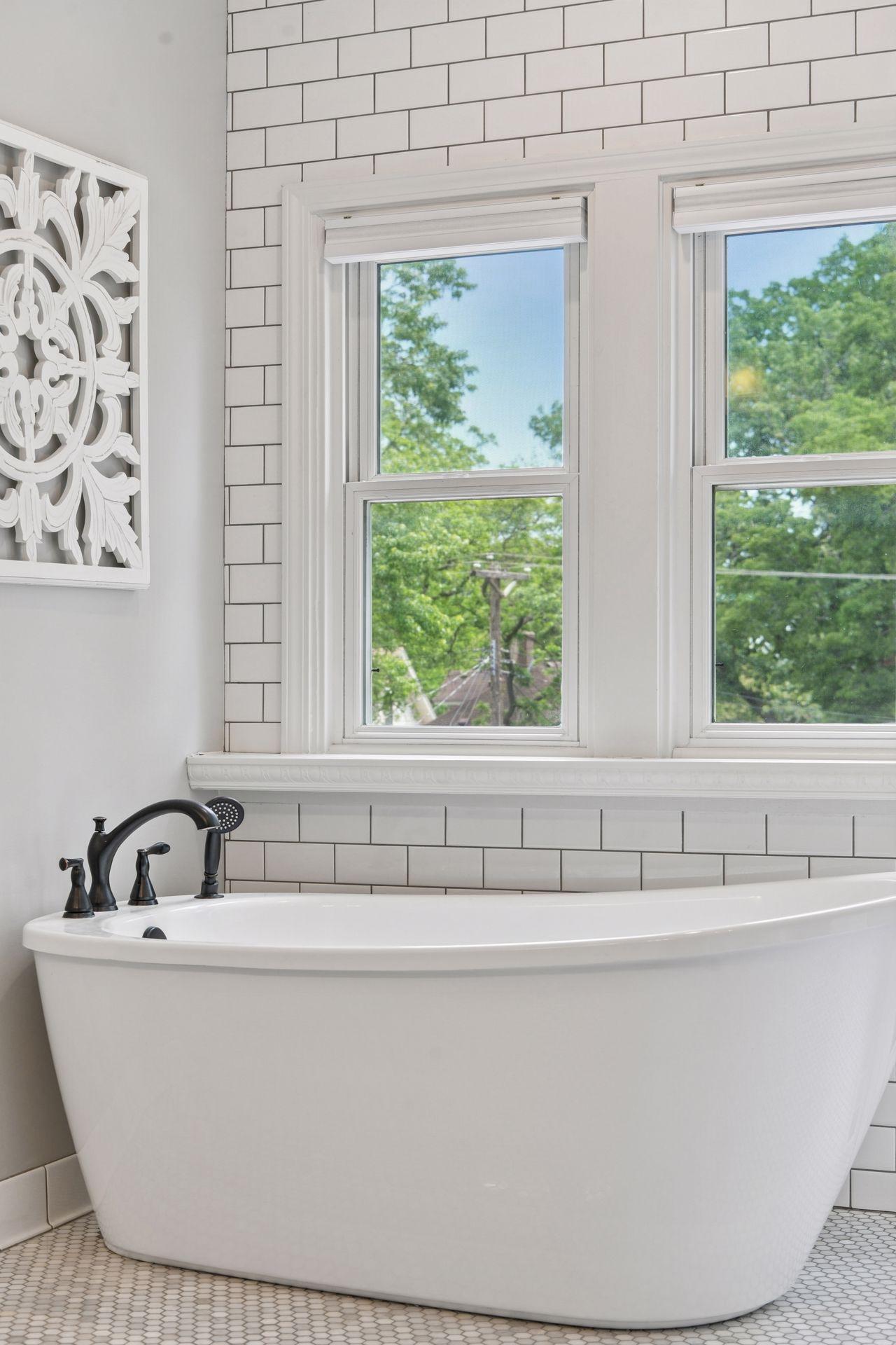 3837 Pleasant Avenue - Imagine soaking in the tree tops!