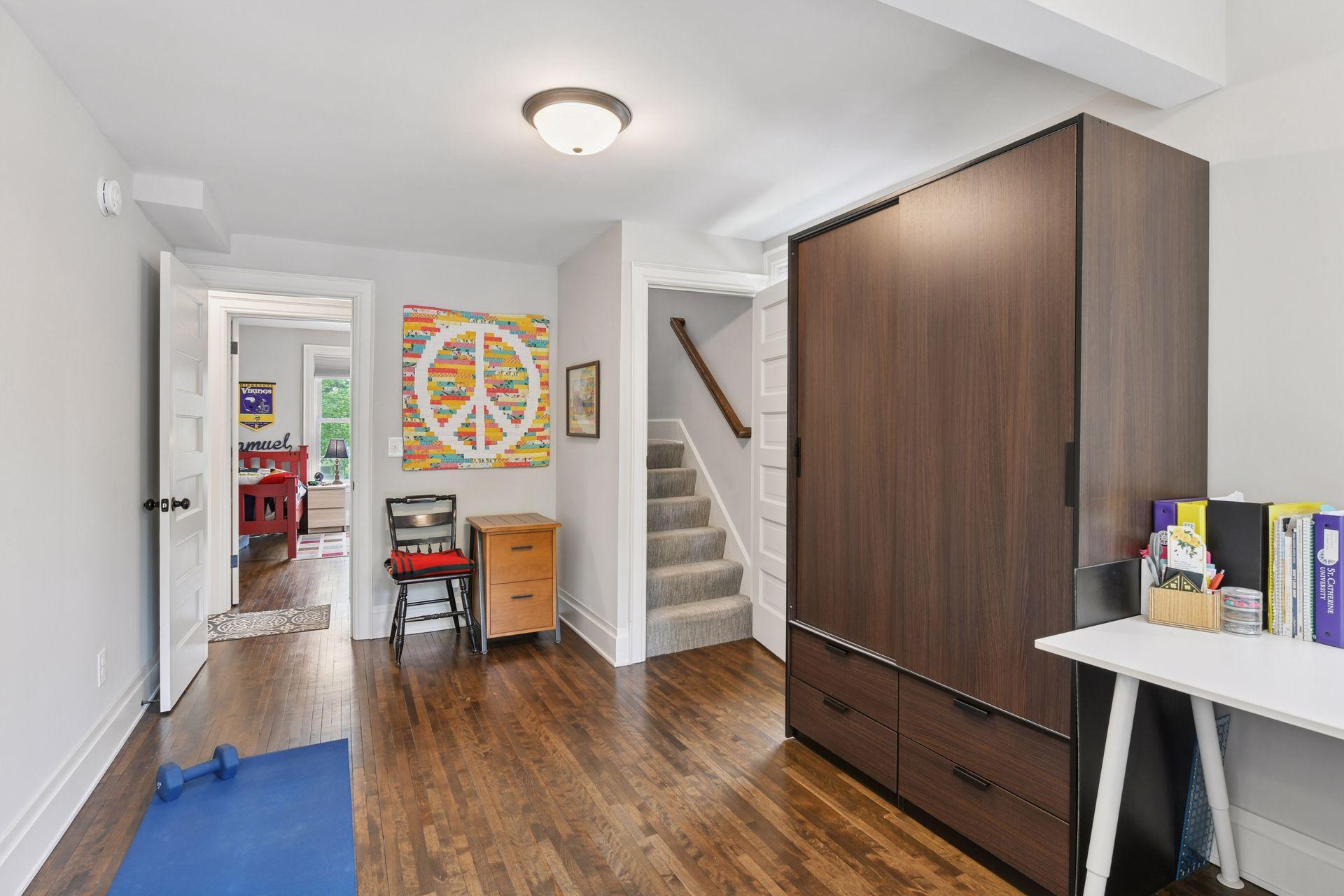 3837 Pleasant Avenue - Flex Room - Stairs go to the primary bedroom suite on the third level, across the hall is the 3rd second level bedroom and this flex room makes a great, yoga studio, office, hobby room...