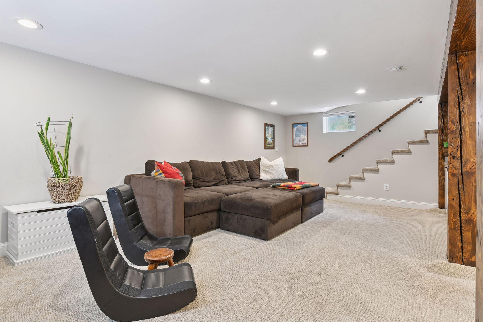 3837 Pleasant Avenue - Lower level Family room - Recessed lighting, egress window and built-in media cabinets.