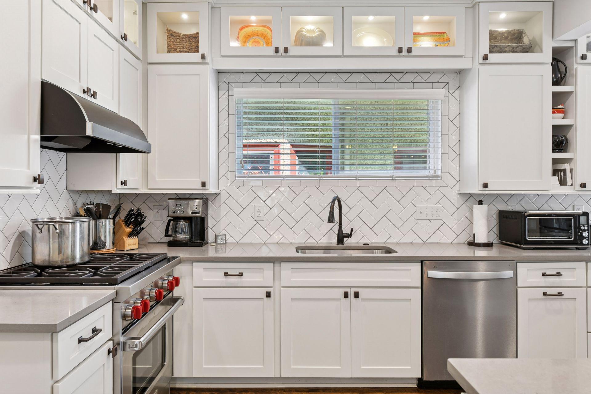 3837 Pleasant Avenue - A true chef's kitchen with high-end stainless steel appliances. Style meets incredible functionality.