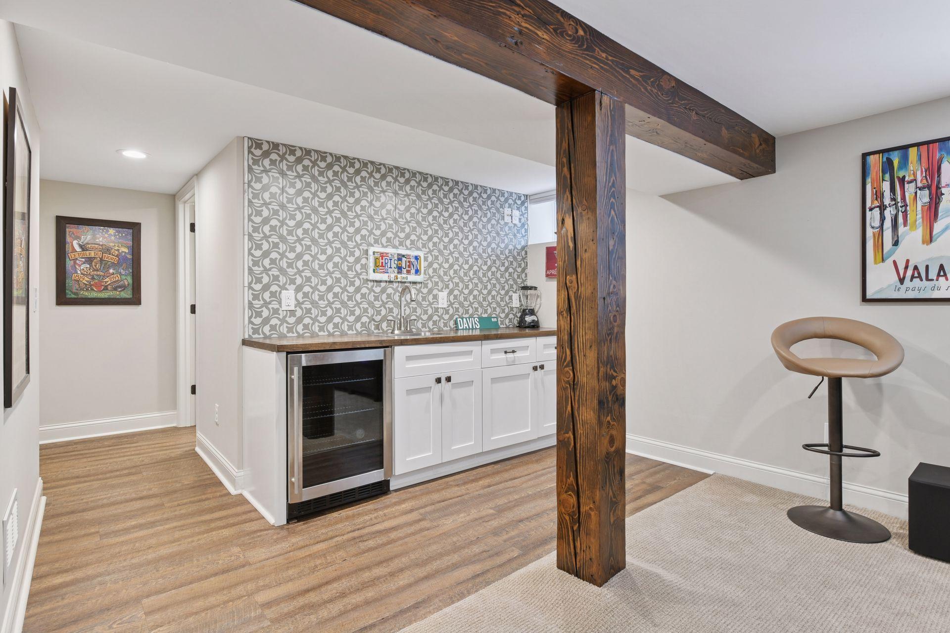3837 Pleasant Avenue - Wet Bar with beverage refrigerator, wood countertop and stylish tile backsplash!
