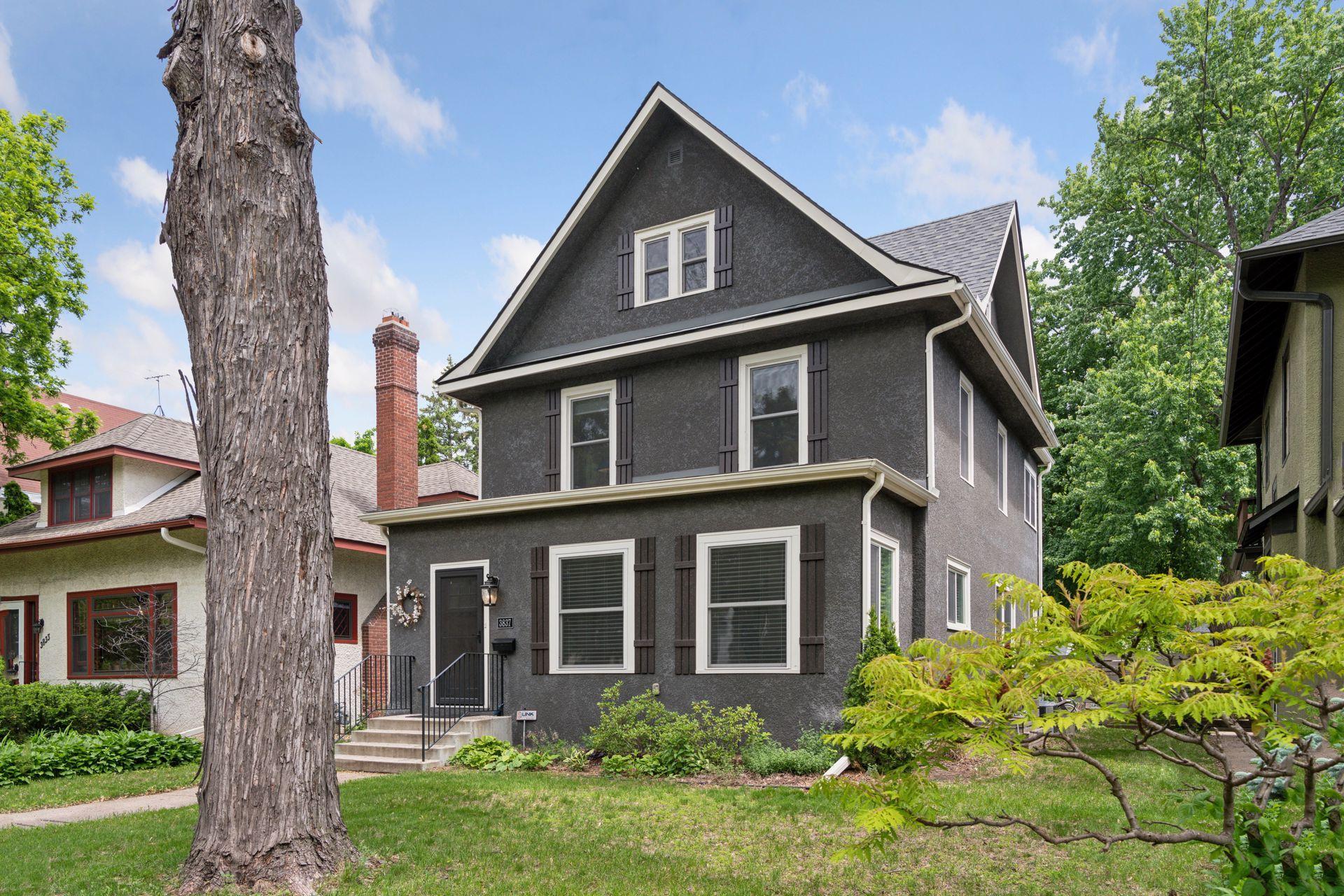 3837 Pleasant Avenue - Situated among other beautiful homes with lush landscapes.
