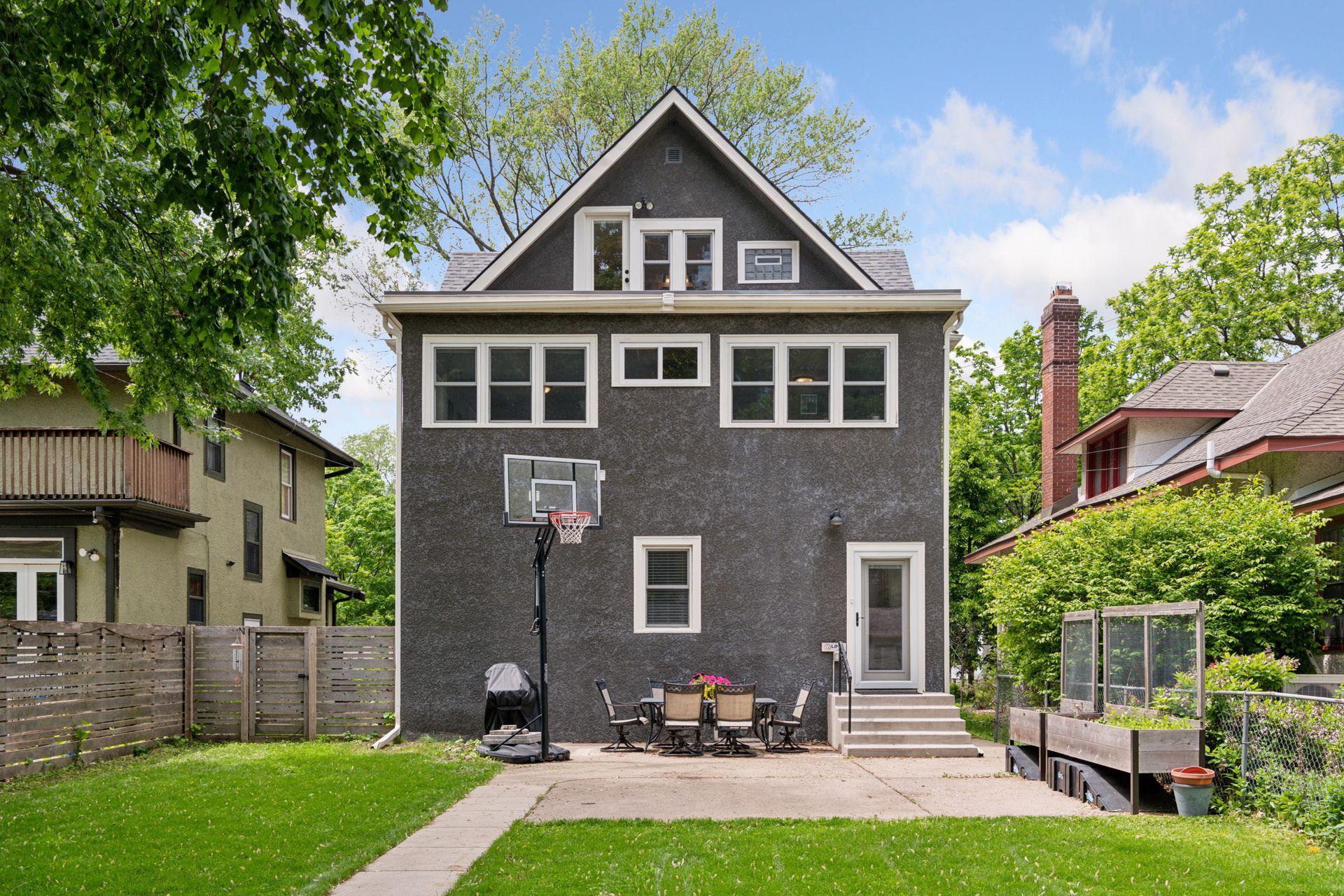 3837 Pleasant Avenue - Relax or entertain in the huge fenced backyard with a versatile patio space—perfect for dining, planting and play.