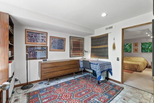 The guest suite is comprised of an office/sitting room, a back bedroom, and a 3/4 bath.