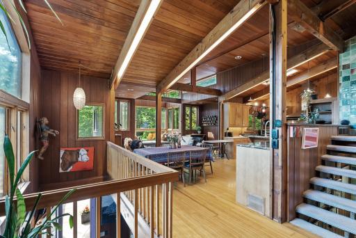 The kitchen, dining area, and living room provide an expansive space for entertaining as well as daily life.