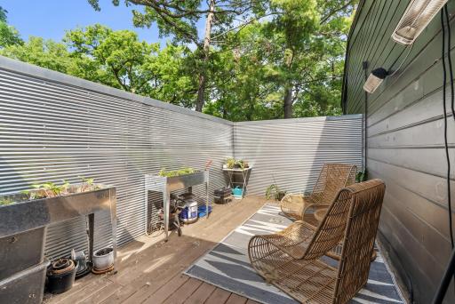 Through the screened-in porch, find a private deck perfect for container gardening, getting some sun, or lounging in a hot tub - there is a hookup already in place.