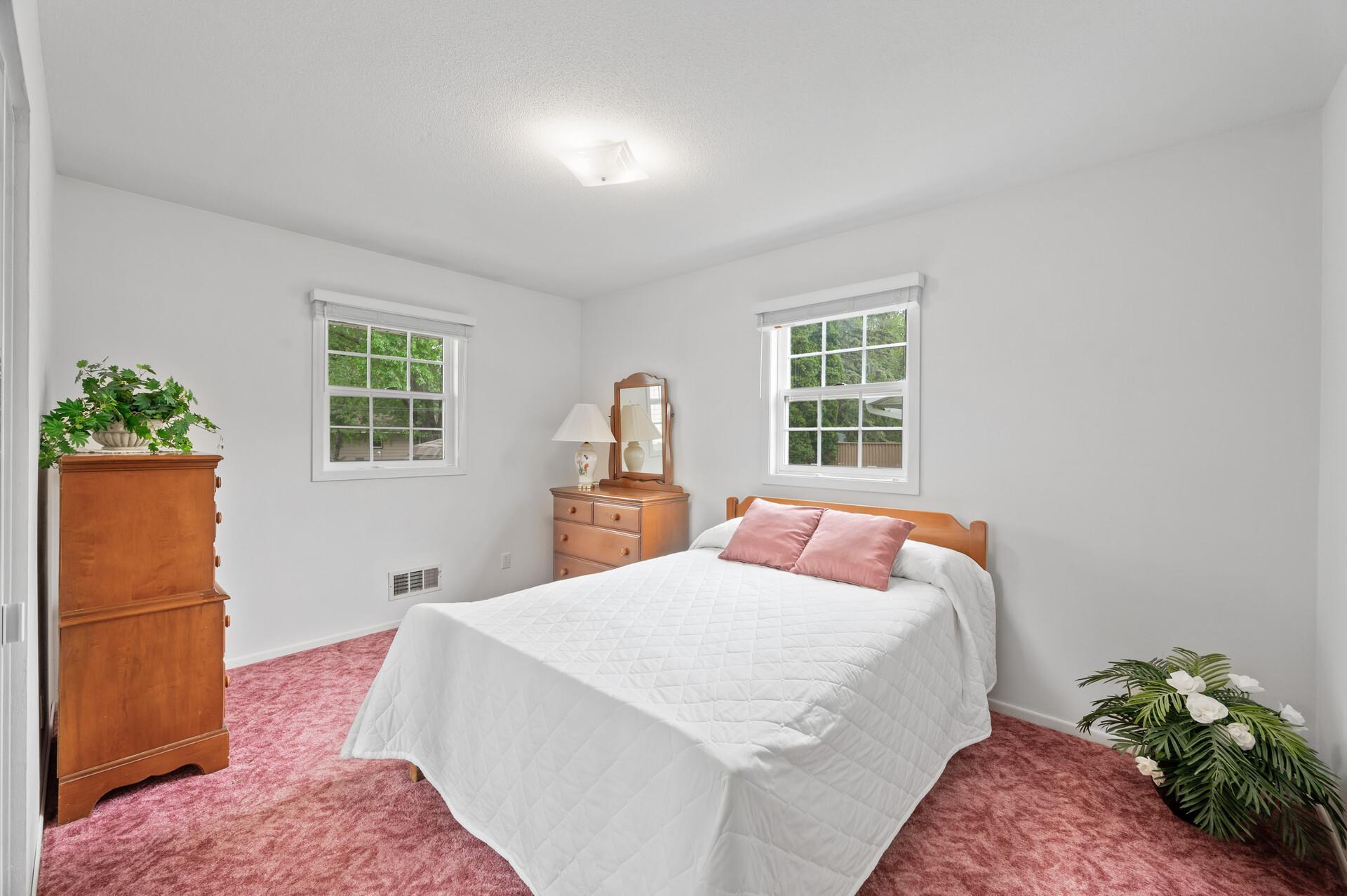 3rd bedroom which also has wood floors under carpeting
