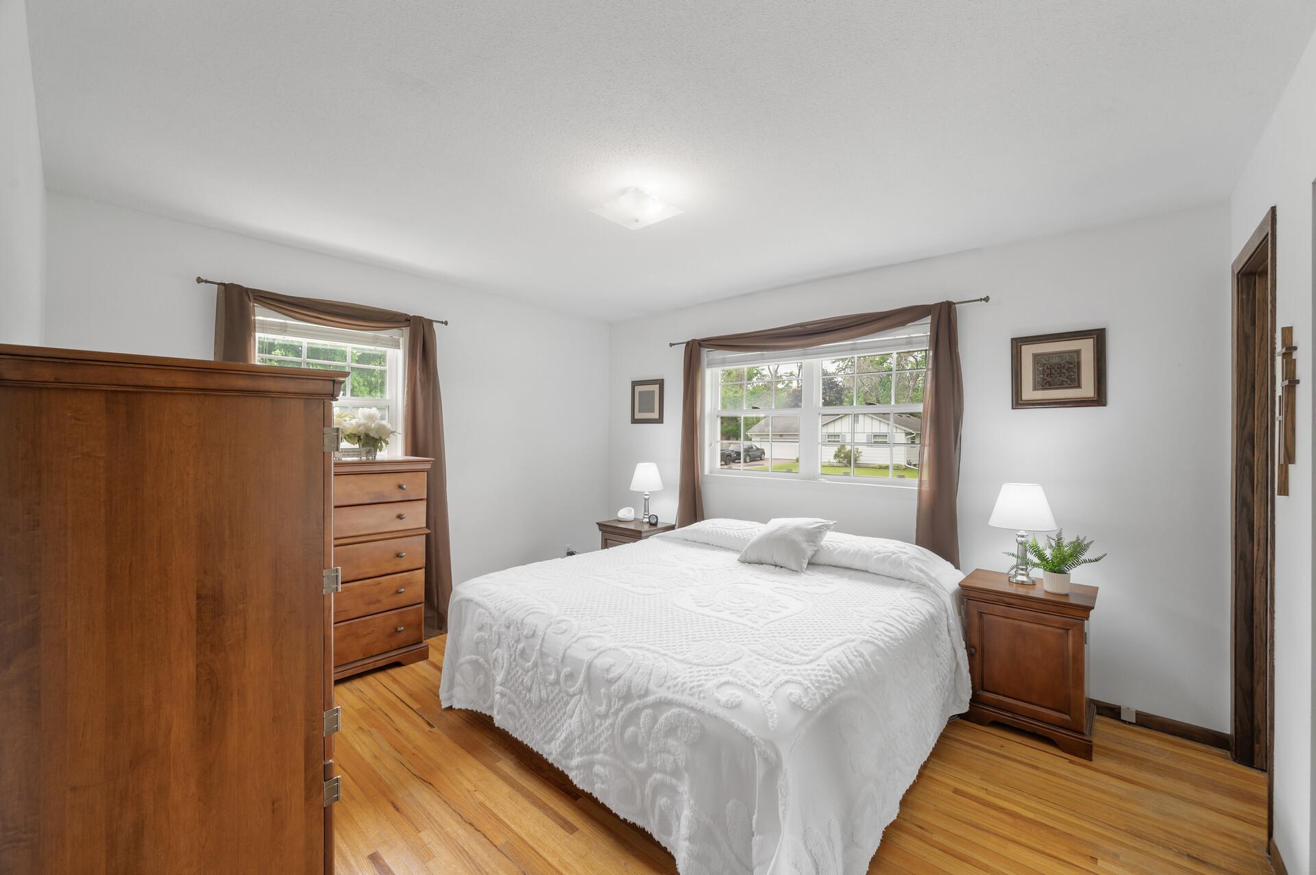 Primary bedroom with walk through to bathroom