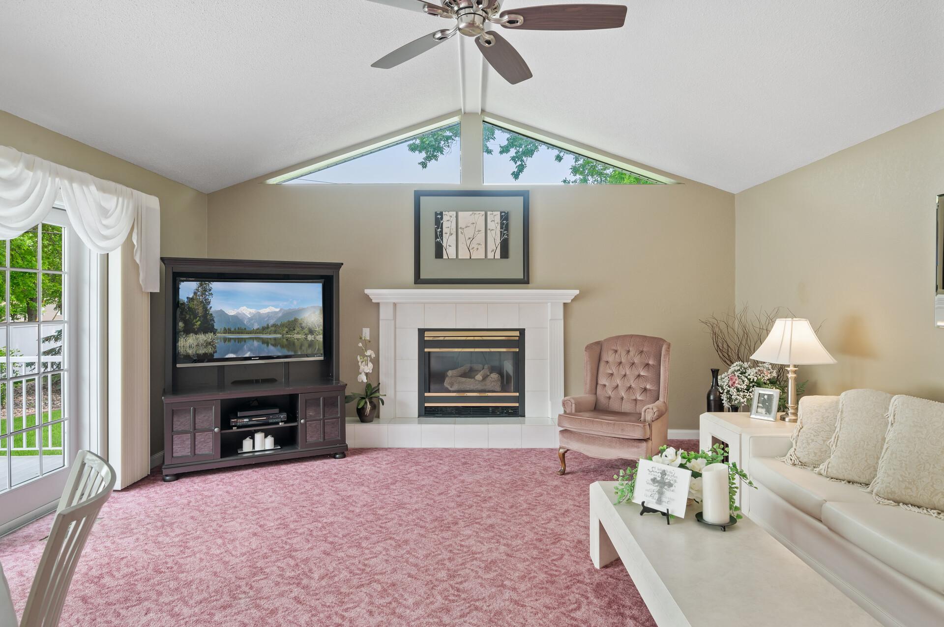 This vaulted addition with gas fireplace provides lots of sunlight