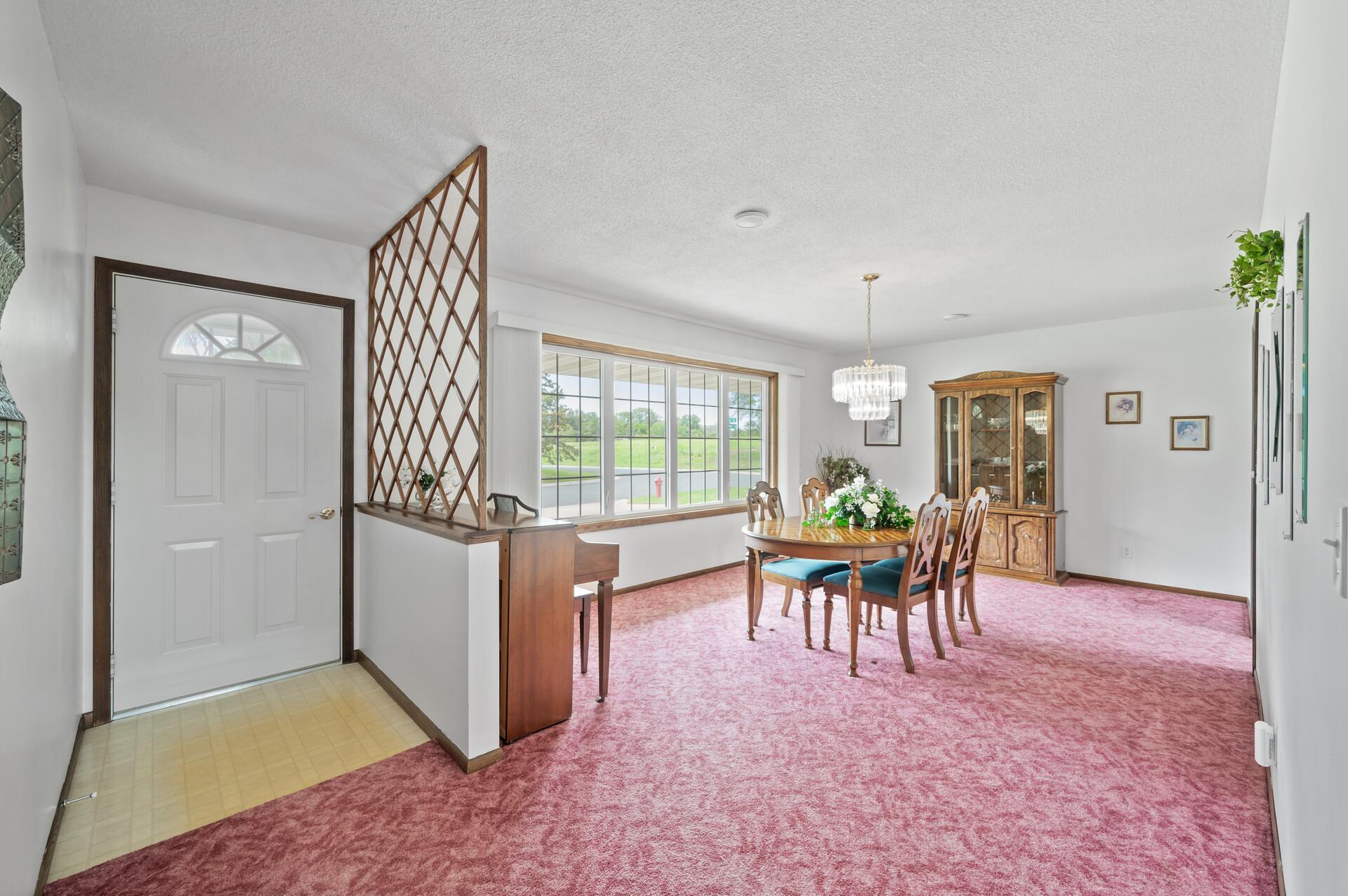Front room currently used as formal dining room but flex it to fit your needs!