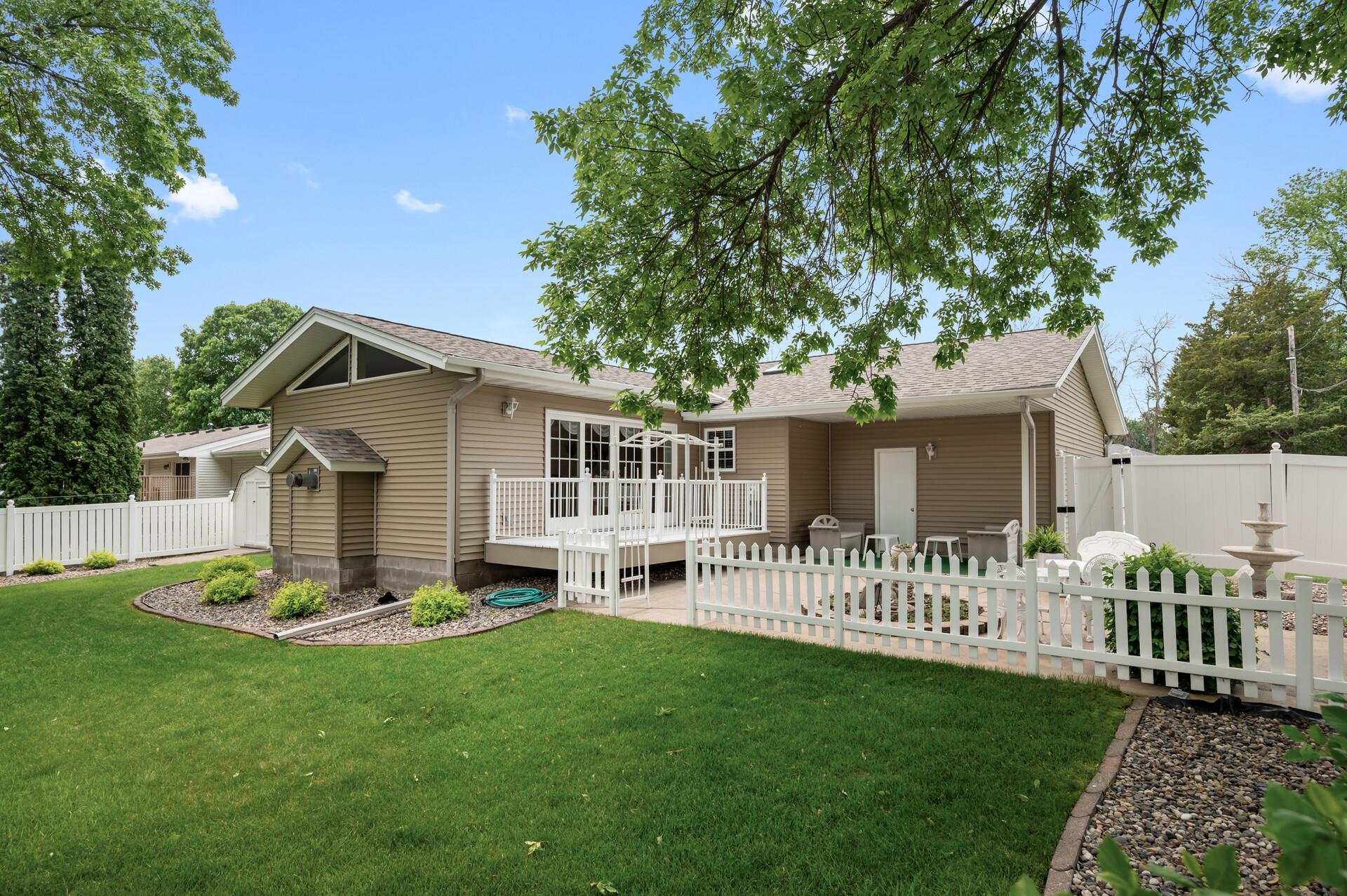Backyard is also beautifully landscaped and private!