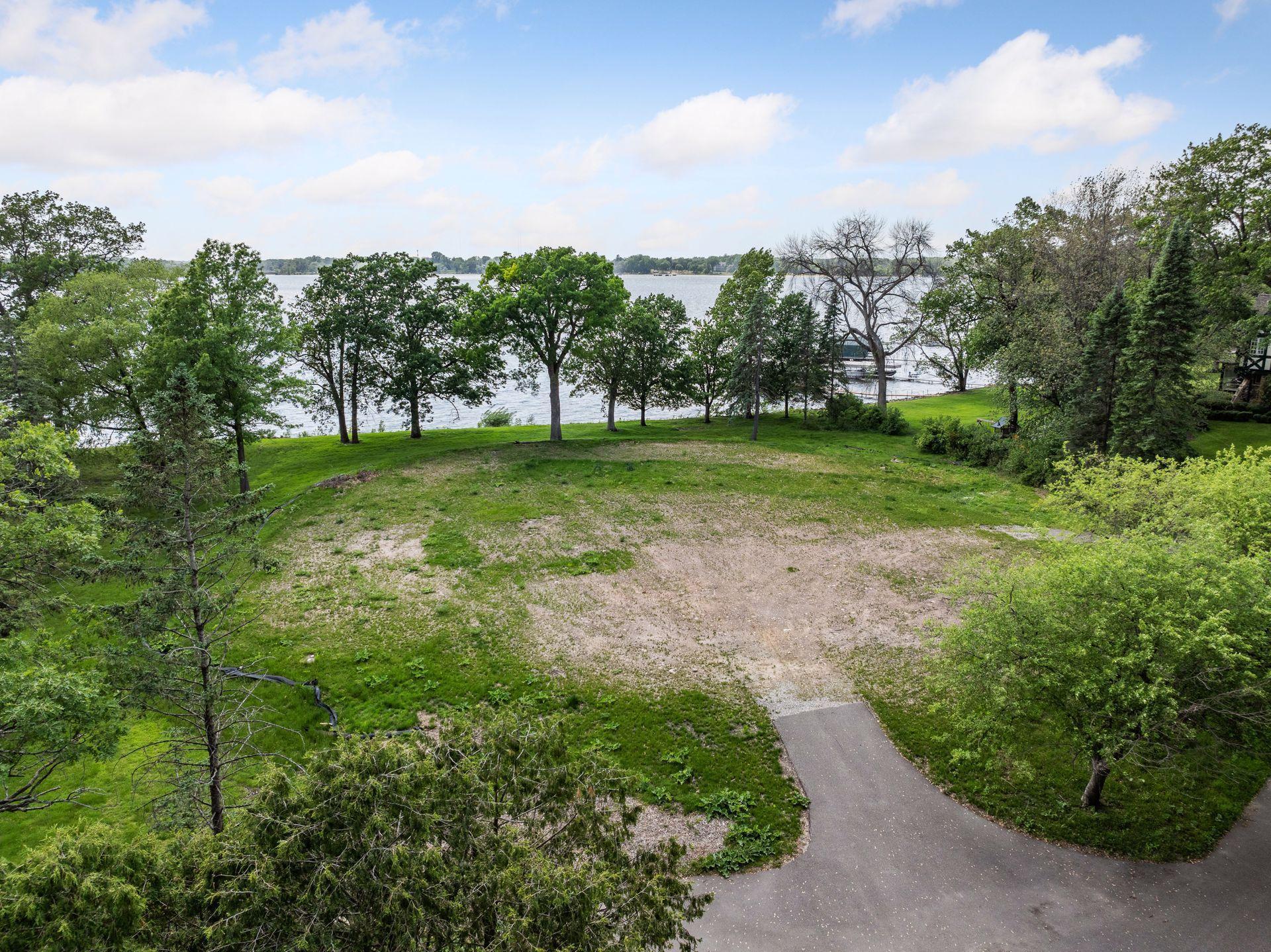 This west facing lot provides daily sunsets and panoramic views with 240 feet of waterfront edged by sculpted shoreline and framed by open skies.