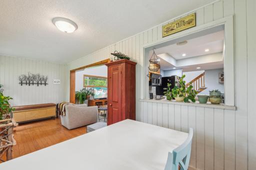 Sunroom off the kitchen with window to the kitchen