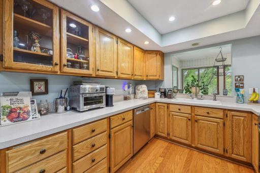 Kitchen includes newer stove, microwave & dishwasher