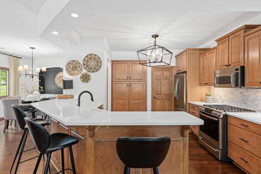 White quartz countertops with grey accents.