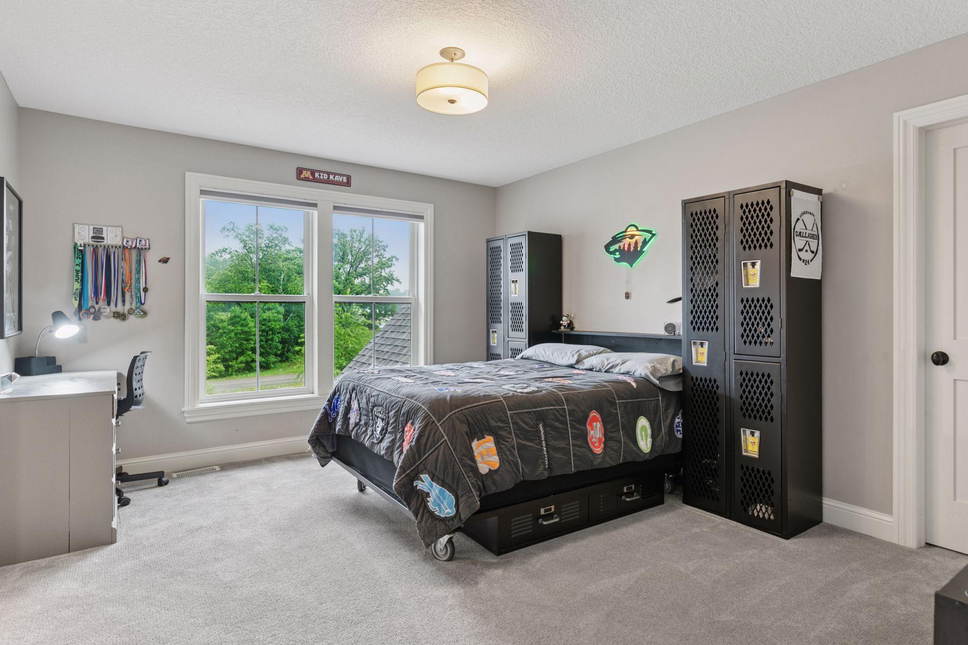 This bedroom has lot of natural light, its own walk-in closet and Jack-and-Jill bathroom.