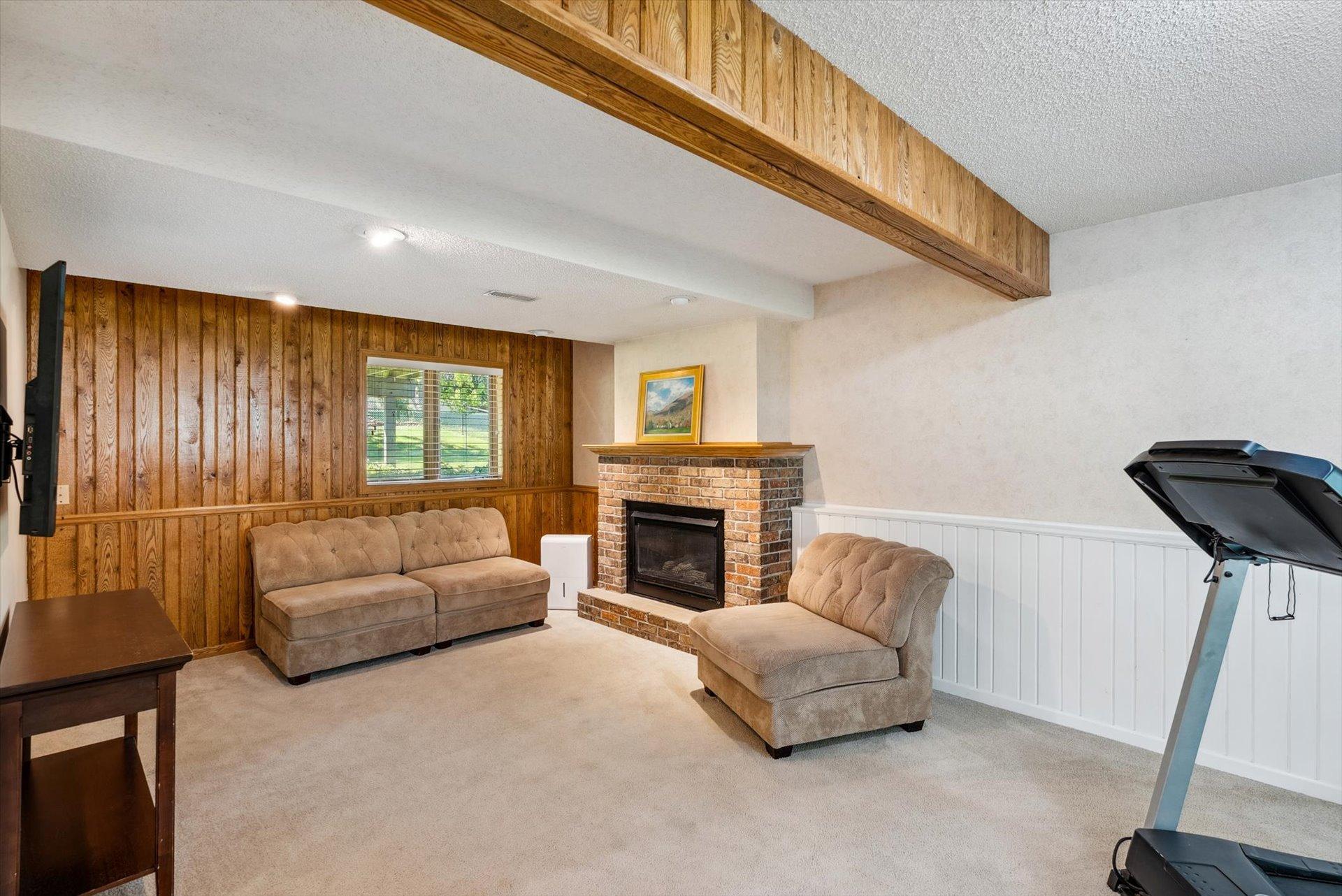 Gas fireplace in the basement family room.