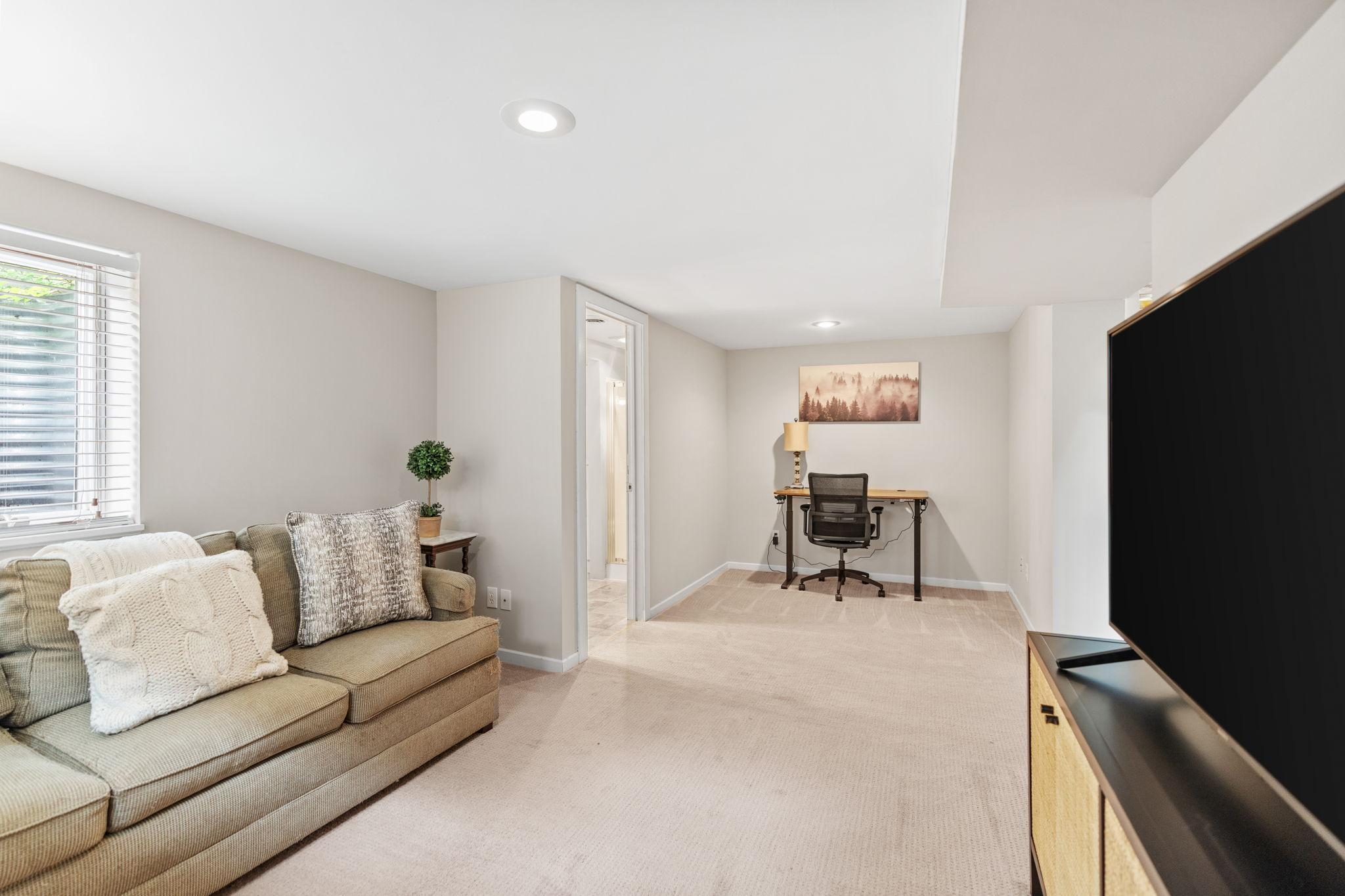 The lower level includes a family room and a great space for a home office.