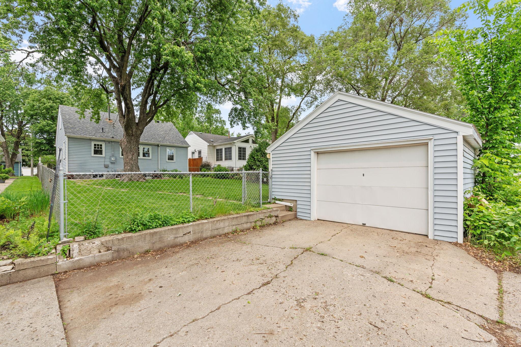 Over-sized one car garage with plenty of space for bikes, mower, etc.