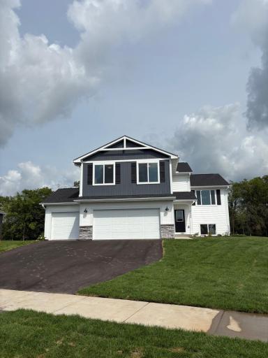Exterior Front w/ Cultured Stone & Horizontal Accent Siding