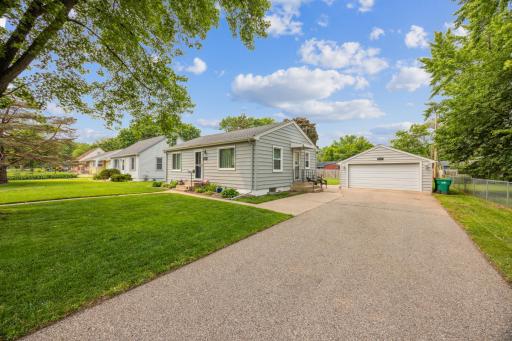 Very well kept & updated rambler with 2 car garage, long driveway, spacious back yard, newer mechanicals, roof, maintenance free siding & newer windows.