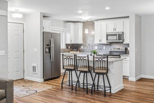 Look at this kitchen!! Custom, soft close cabinets designed for living.