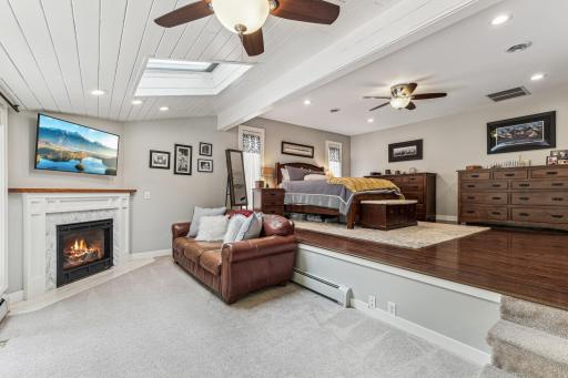 Gas fireplace and bonus space within the primary bedroom