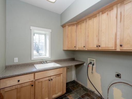 Main floor laundry room with hook upsjpg.jpg